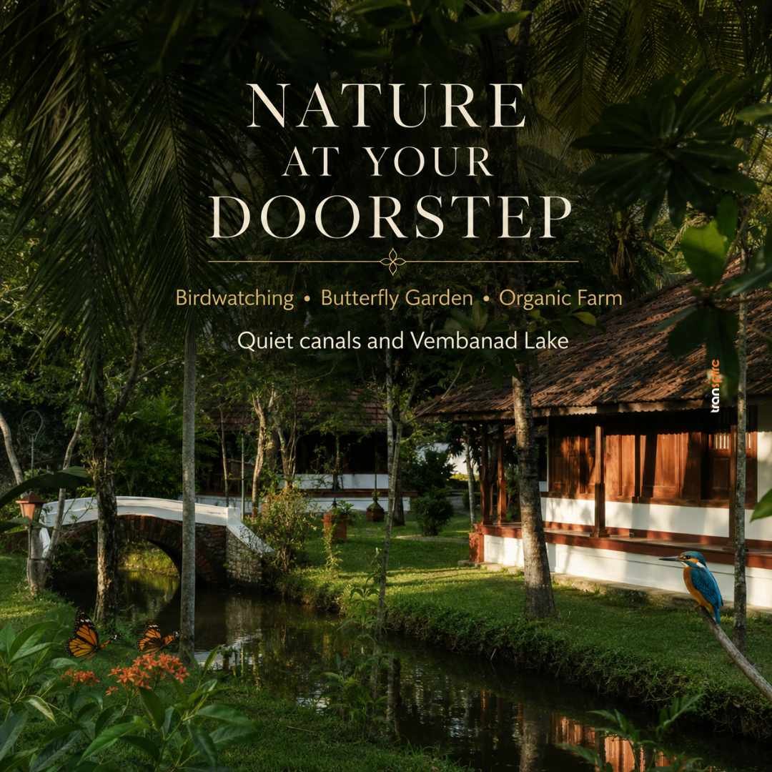 Wake Up Surrounded by Nature Text overlay 'Nature at Your Doorstep' atop a tropical garden scene with a thatched pavilion, small bridge over a canal, and a kingfisher perched nearby.
